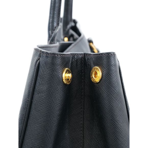 Good Condition Prada Black Leather Handbag with Gold-Tone Hardware Bags